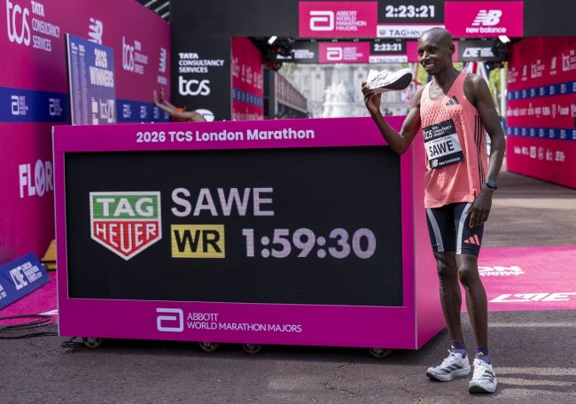 Sabastian Sawe (KEN) celebrates his World Record in an official time of 01:59:30 in the Elite Men’s Race during the TCS London Marathon on Sunday 26th April 2026. Photo: Shaun Brooks for London Marathon Events